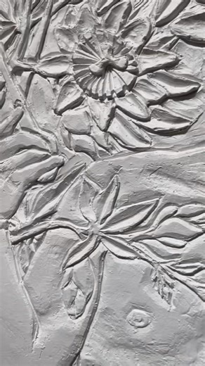 This ceramic wall hanging sculpture is titled “Pruning passion” I love carving figures and looking back at this work just makes me want to do more! #Pottery #ceramics #sculpture #figuresculpture | Benjamin Cahoon Creative