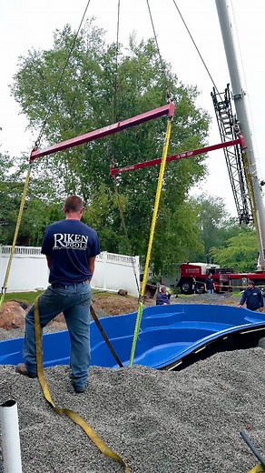 You don’t trust a job like this to just anyone. This in-ground pool was delivered, lifted over the house, and set with exact precision by our experienced crew. Safety and quality first, every time. Got questions about installing your own pool? We’re happy to answer them. #RikenPools #RIContractors #IngroundPoolLife #BackyardUpgradeRI #PoolInstallDay | RIKEN POOLS