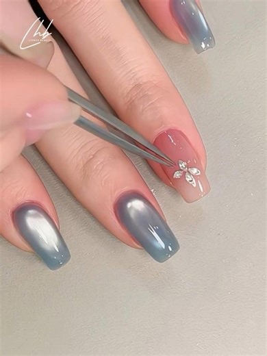 Luvher Beauty Gel Polish on Instagram: "Fresh & luminous, with simple steps! ✨🌼 Matte dusty blue cat eye + sheer nude base + subtle crystal detail Ideal for daily wear and minimalist looks! ✨ 🛍️ Shop Our Nail Essentials: ✈ Free Shipping on Orders $39+ ⚡ 20% OFF with Code: LUV20 🛒 www.luvherbeauty.com 📲 Follow us for more nail inspo: 📸 Instagram: @luvher_beauty 🎵 TikTok: @luvherbeauty_usa 📘 Facebook: @LuvherBeautyNails #BlueNails #CatEyeNails #NailTutorial #NailArtIdeas #NailInspo #LuvherB