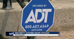 Neighbors frustrated by stolen security system signs