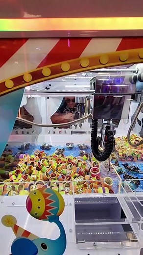 Winning Among Us Keychain at the Arcade