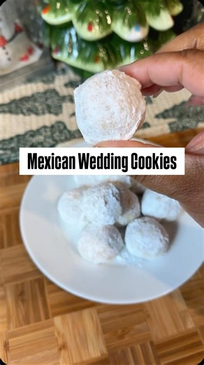 These Mexican Wedding Cookies are buttery, nutty, and literally melt in your mouth 🤍�Made with just a few pantry staples and finished with a double coating of powdered sugar for that classic snowy look. Ingredients - 1 cup unsalted butter, softened - ½ cup powdered sugar - 1 tsp vanilla extract - 2 cups all purpose flour - 1 cup finely chopped pecans - Extra powdered sugar (for coating) Directions 1. Mix butter, sugar, and vanilla. 2. Add flour and pecans. Chill dough for 30 minutes. 3. Roll in