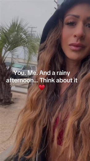 Cuddle Weather: Enjoying a Rainy Day Together