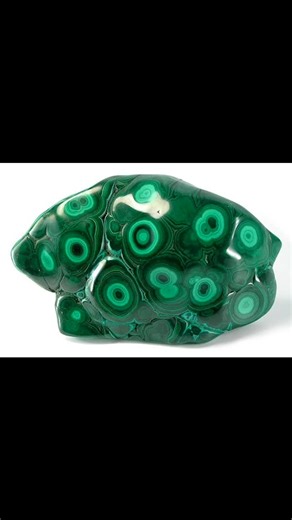 WHAT IS MALACHITE? Malachite is a bright green mineral made of copper carbonate hydroxide. Its chemical formula is Cu₂CO₃(OH)₂. Here’s a quick overview: Color: Vibrant green, often with light and dark banded patterns. Formation: It forms near the surface where copper minerals weather or oxidize, often alongside azurite, chrysocolla, and turquoise. Appearance: Found as botryoidal (rounded masses), fibrous crusts, or stalactitic formations — and can be polished to a beautiful shine. Uses: Popular 