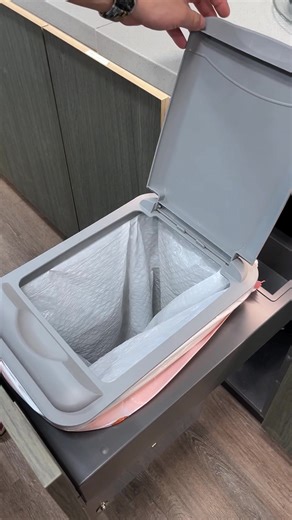 This is what a pull-out trash cabinet actually looks like. #cabinet #kitchencabinets #kitchendesign #kitchenmusthaves #interiordesign