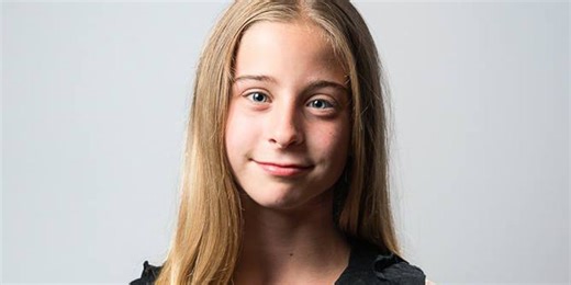 17 photos of adorable kids who were born prematurely, now holding their own baby pictures