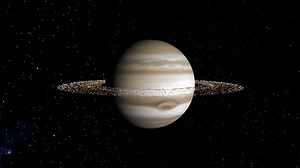 Jupiter's rings may be so puny because of the planet's massive moons