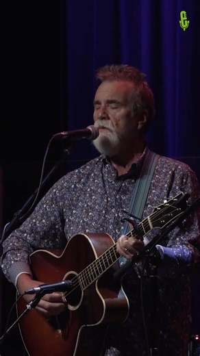 5.3K views · 94 reactions | From this week’s broadcast, Darrell Scott shares Paul Simon’s “American Tune,” a timely reminder to carry on when the road feels long. What a great cover. Here is the full version: https://www.youtube.com/watch?v=LJcNL1swDtM&feature=youtu.be | eTown | Facebook