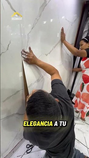 Installing marble adhesive sheets on walls