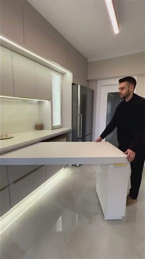 A twin-leg rotating bar table for kitchen islands.