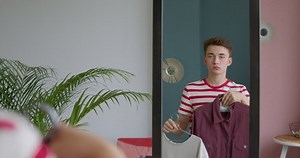 Young Man Going Meeting Chooses Clothes Stock Footage Video (100% Royalty-free) 1055943680 | Shutterstock