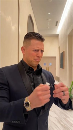 When you accidentally swap earbuds with The Miz 😅