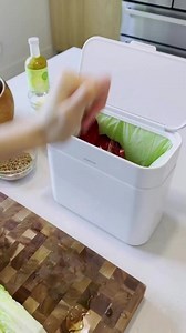 meal prep made sustainable ♻️ reduce waste and nourish your garden one meal at a time with our odor-minimizing compost caddy. keep it on the countertop during meal prep and dock it on the side of your can when you're done. | simplehuman