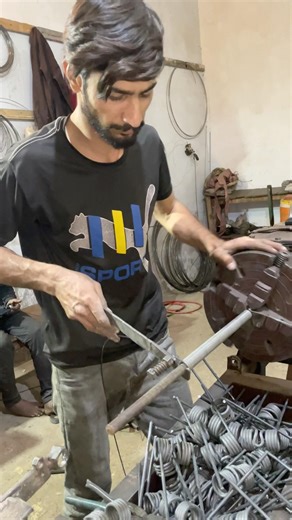 This is a new simple spring on a lathe machine by hand #shortsvirl