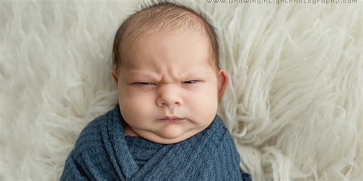 Grumpy baby goes viral for hilarious newborn photoshoot