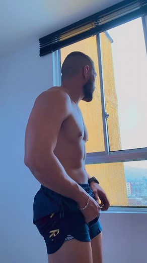 Muscular Male Model in Stylish Shorts