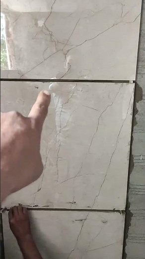 pencil design tiles installation in big tiles