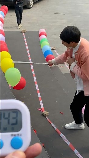 Most balloons burst with nunchaku in one minute - 74 by Xie Desheng (China) 🎈