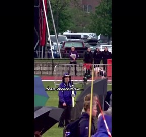 Runner jumps over a water barrier but trips and falls in water