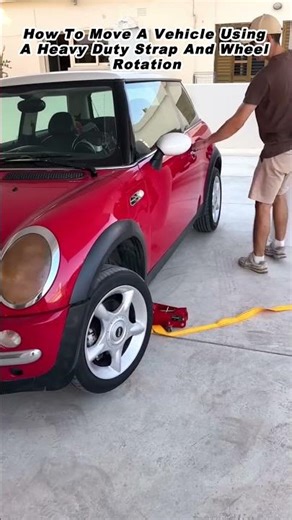 How To Move A Vehicle Using A Heavy Duty Strap And Wheel Rotation