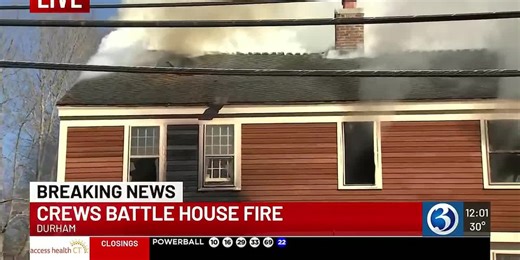 House fire closes road in Durham