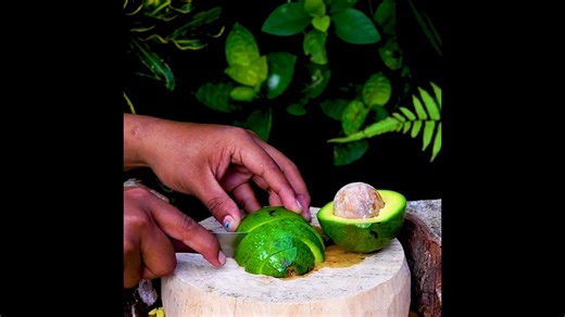 Cutting Avocado In Half And Slicing Into Pieces