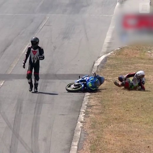 Have you ever seen anything like this?! Two riders fight during a motorbike race 😮 | ESPN UK