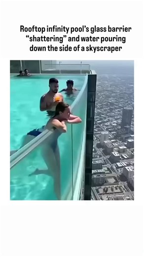 Candy Crush on Instagram: "This clip looks like a catastrophic real-world accident — a rooftop infinity pool’s glass barrier “shattering” and water pouring down the side of a skyscraper — but it’s not real. A closer breakdown shows it’s AI-generated: Unnaturally uniform water behavior – Real cascading water breaks into chaotic, uneven sheets and mist. Here, the flow is too smooth and symmetrical, a common AI tell. Glass physics don’t add up – Tempered or laminated glass fails in characteristic c