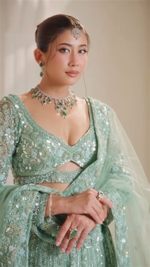 Siwangi Pradhan on Instagram: "The Celadon Royal Lehenga featuring @asmishresthaa Asmi wears a pistachio-green lehenga in refined monochrome embroidery, paired with a sculpted cut-out blouse and a perfectly matched dupatta."
