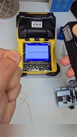You join two fiber optic cables permanently with fusion splicing 🔗✨ #fiberoptics #cables #splicing