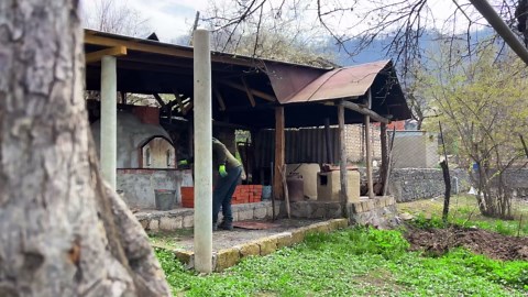 Meat loaf with vegetables on a spit | Traditional village cooking