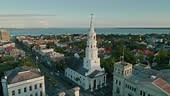 Aerial establishing shot of Charleston, South Carolina, flying over...