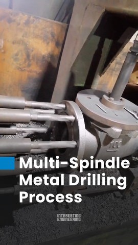 This specialized machine carefully drills screw holes into this two-way valve. Made of material like ductile iron GGG40, the valve ensures strong sealing performance, pressure resistance, and more, perfect for industrial and infrastructural projects. | Interesting Engineering