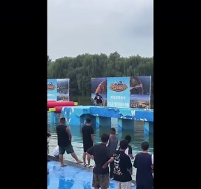 Contestant falls into water during obstacle course showdown in China