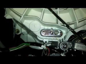 Heater element and thermostat replacement on washing machine