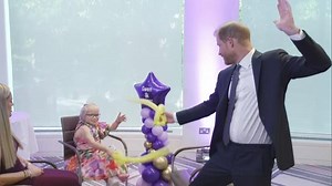 Prince Harry has balloon sword fight at WellChild Awards
