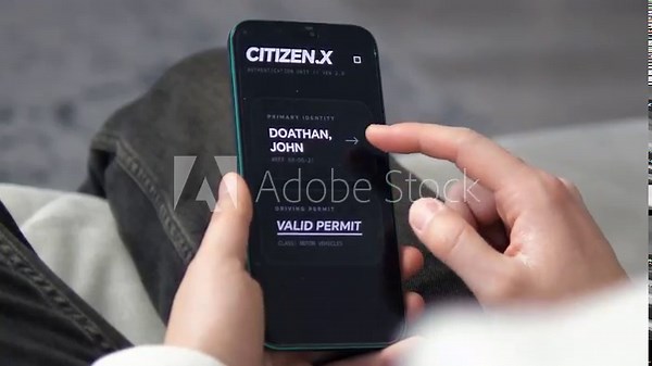 Close-up of a person verifying identity credentials via a secure smartphone application. Modern dark mode UI with fully verified status. Ideal for projects on identity theft prevention, digital