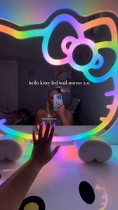 166K views · 5.2K reactions | The cutest mirror in town! @annmarieszn and the Hello Kitty ® RGB Wall Mirror 2.0 W/ Bluetooth Speakers and Specialty Base. #ImpressionsVanity #HelloKitty #Sanrio | Impressions Vanity Co. | Facebook