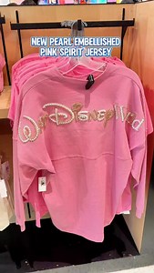 New pearl embellished pink spirit jersey at EPCOT 🩷🤍💕✨ #disneyparks #disneyworld #epcot #disneymerch #spiritjersey | MickeyBlog.com