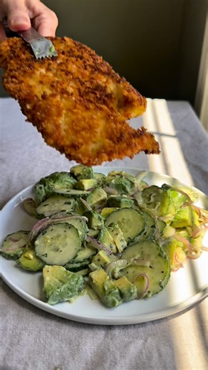Crispy Chicken and Avocado Cucumber Salad! So simple and fresh!⁣ ⁣ Here’s how to make it:⁣ ⁣ Prepare Buttermilk Dressing: Add 1/3 c. buttermilk, 2 tbsp mayonnaise, juice and zest of 1 lemon, 2 tsp dijon mustard, 1 tsp honey, a handful of fresh parsley (chopped fine) and salt and pepper to a bowl and whisk vigorously, slowly add in 2 tbsp olive oil and stir in until emulsified.⁣⁣⁣⁣⁣ ⁣⁣⁣⁣⁣⁣⁣⁣ Prepare Salad: dice 2 avocados, thinly slice 1 english cucumber, thinly slice 1 small red onion and add to