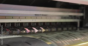 Modern Digital Large format UV printer. Printing production technologies. UV pinning is the process of applying a dose of low intensity ultraviolet light to a UV curable ink