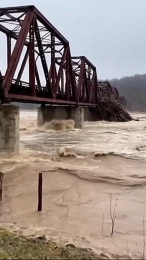 9.9K views · 111 reactions | Floodwaters Tear Down a Segment of an Old Iron Bridge | When Weather Strikes | Facebook