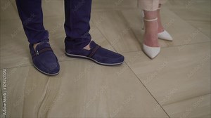 Groom waiting for bride tapping his feet on wedding day