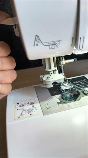 How to use your sewing machine's automatic needle threader. #sewing #needlethreader #sewinghacks