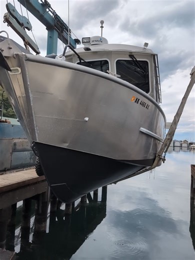 Back in the water she goes! #AluminumBoats #leeshoreboats | Lee Shore Boats