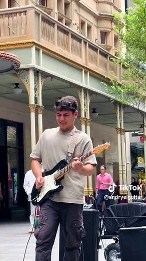 Captivating Guitar Solo - Busker's Impressive Tribute to Santana