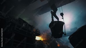 Hard work in the foundry. Pouring molten steel. Liquid steel pouring. Molten metal pouring, metallurgy, steel casting foundry. Steel manufacturing.4K