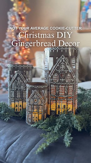 These DIY gingerbread lanterns are the sweetest thing you'll bake up this Christmas... without even turning on your oven. 🍪✨ If you’ve been drooling over gingerbread houses but don’t wanna spend hours baking or $$$ on new gingerbread decor, omg you’re gonna love this Christmas DIY idea! All it takes is a little spray paint and some puffy paint to outline the sugary details, and suddenly your lanterns look like they came straight out of Mrs. Claus’ bakery. Tbh, these aren’t just lanterns — they’