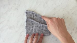 Purl Soho on Instagram: "As you’re knitting our gorgeous Forest Henley pattern, you bind off the underarm stitches while shaping the armhole. Then you come back later, pick up stitches, and knit the sleeves. Also useful for shoulder slopes, necklines, or any other slanted edge, our sloped bind off tutorial walks you through this super easy technique, so you create a smooth line that looks beautiful, and is ready for tidy pick ups down the road! Follow our profile link to watch the full tutorial 