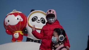 Beijing locals take selfies outside Olympic venue